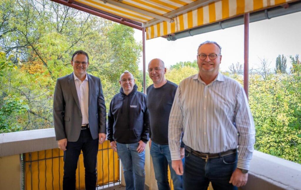 Präsident und 3 der Kollegen, die Jubiläum feiern